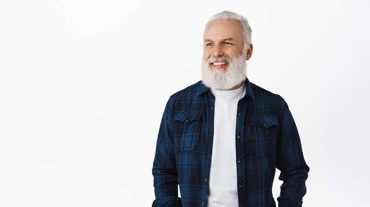 distinguished gentleman smilling with dental implants