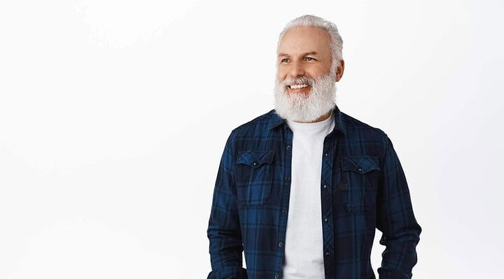 distinguished gentleman smilling with dental implants