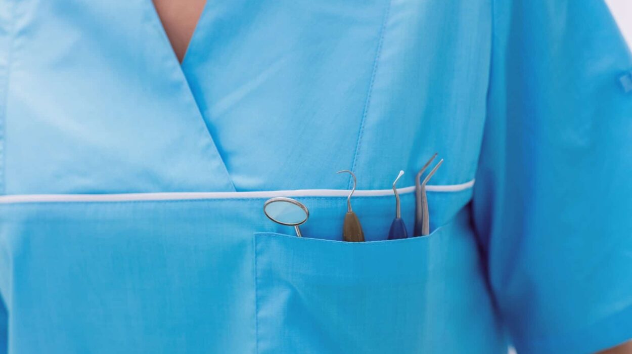 close up of a dental hygienist with dentist tools in front pocket