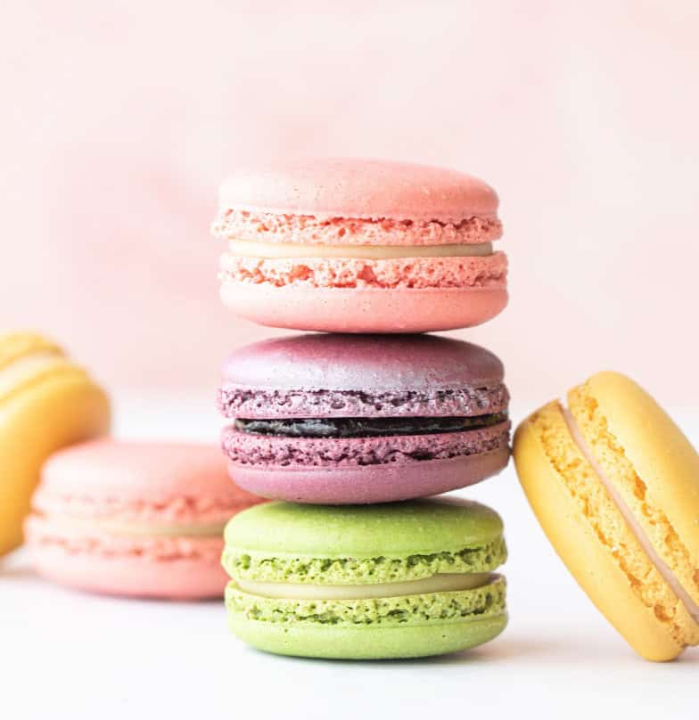stacked macaroons pink background